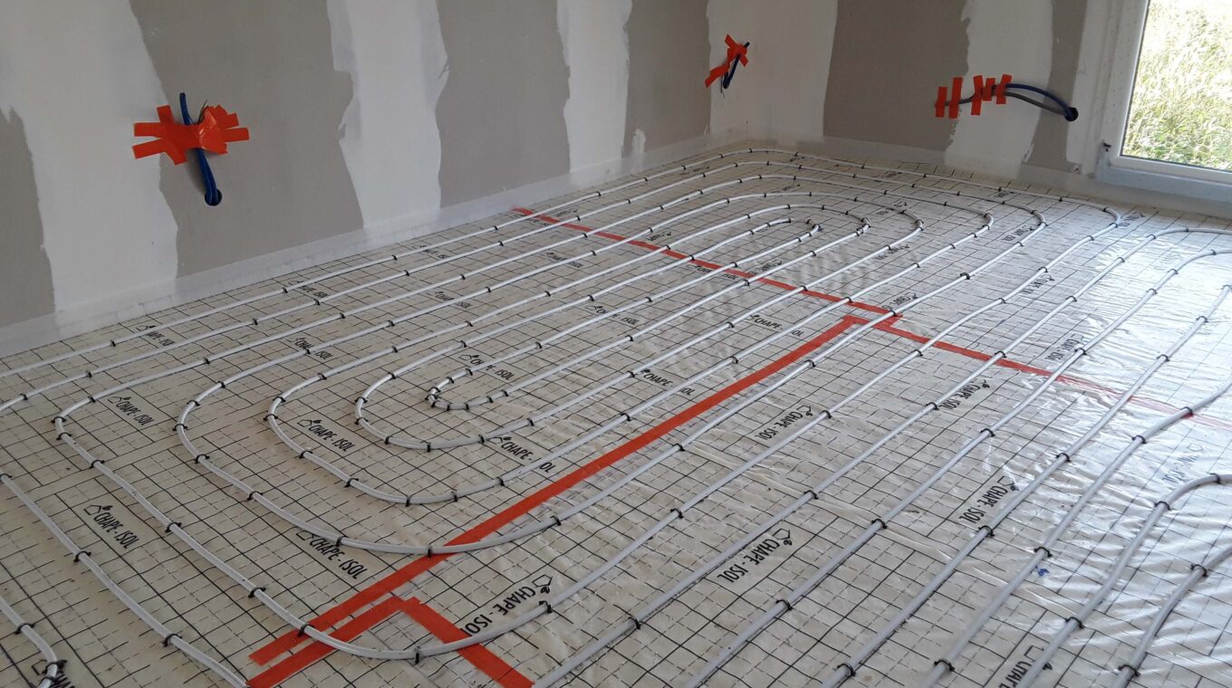pose chauffage au sol chantier maison