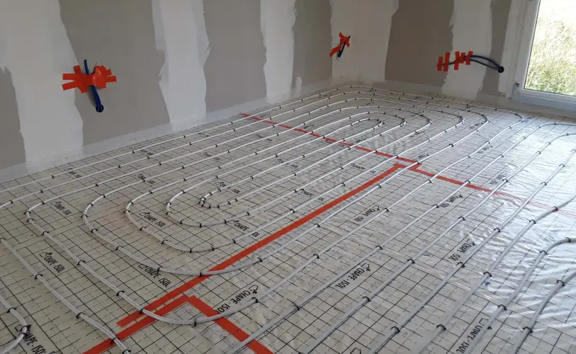 pose chauffage au sol chantier maison